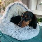 Cozy plush pet bed for cats and dogs – soft, washable, anti-slip design that reduces anxiety and keeps pets warm and comfortable.